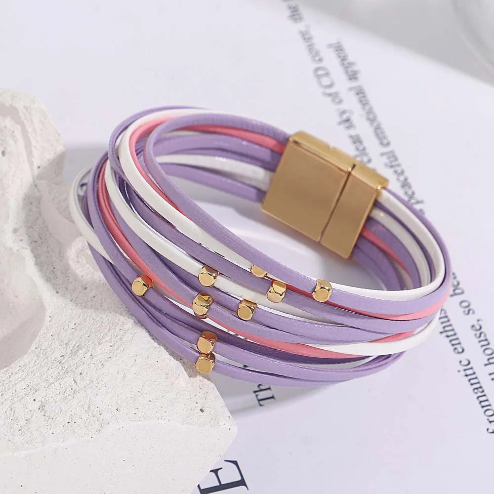 Detailed view of a women's tri-color multi-layer wrap bracelet, showcasing its unique design.