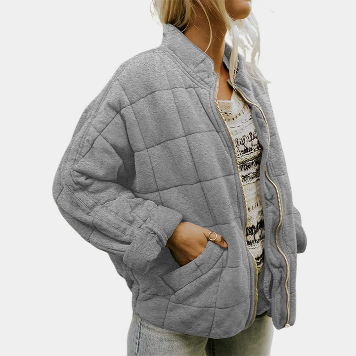 Durable women's warm transitional jacket, great for outdoor adventures in fall & spring. Practical & stylish.