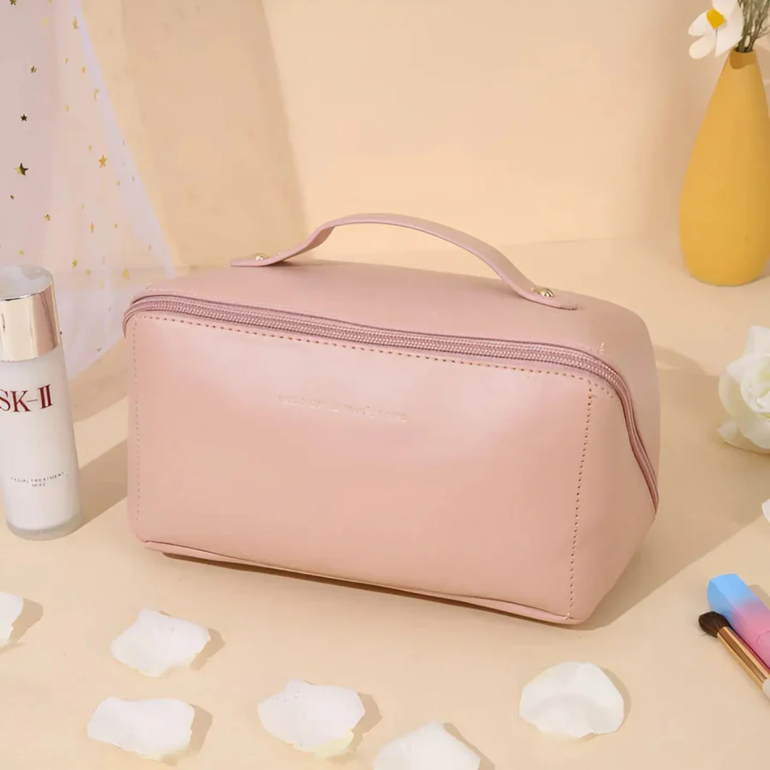 Open women's waterproof cosmetic bag, showing ample space and compartments for all beauty accessories.