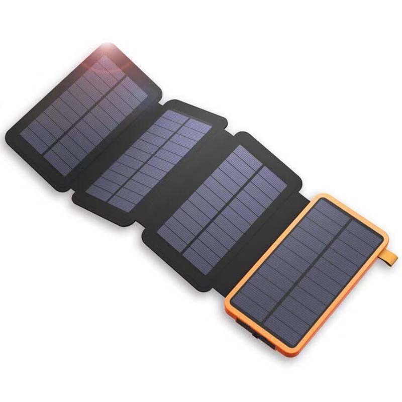 SunCore 4-panel solar power bank charging smartphone outdoors, portable charger with 3 USB outputs
