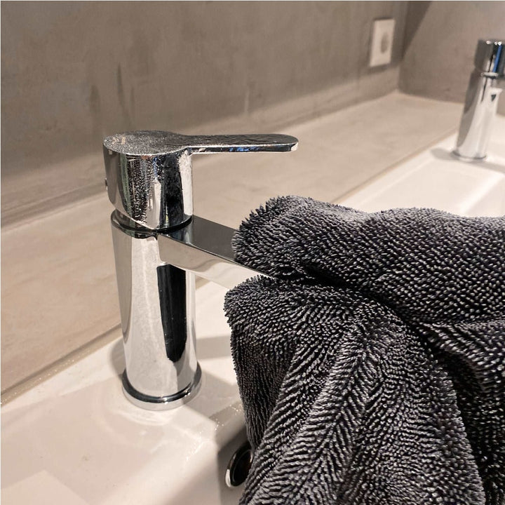 Microfiber drying towel, ultra-absorbent for car care, leaving a perfect streak-free shine.
