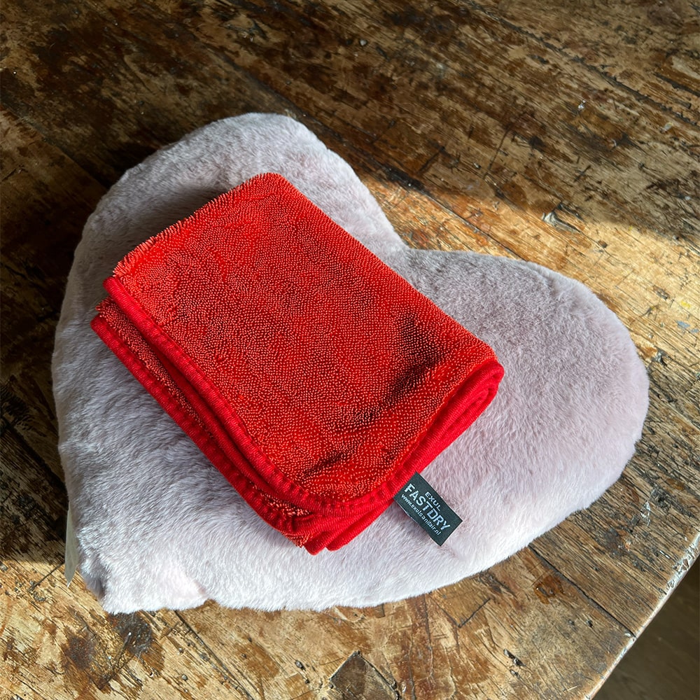 Soft, plush microfiber cloth for gentle yet effective cleaning and drying without scratching surfaces.