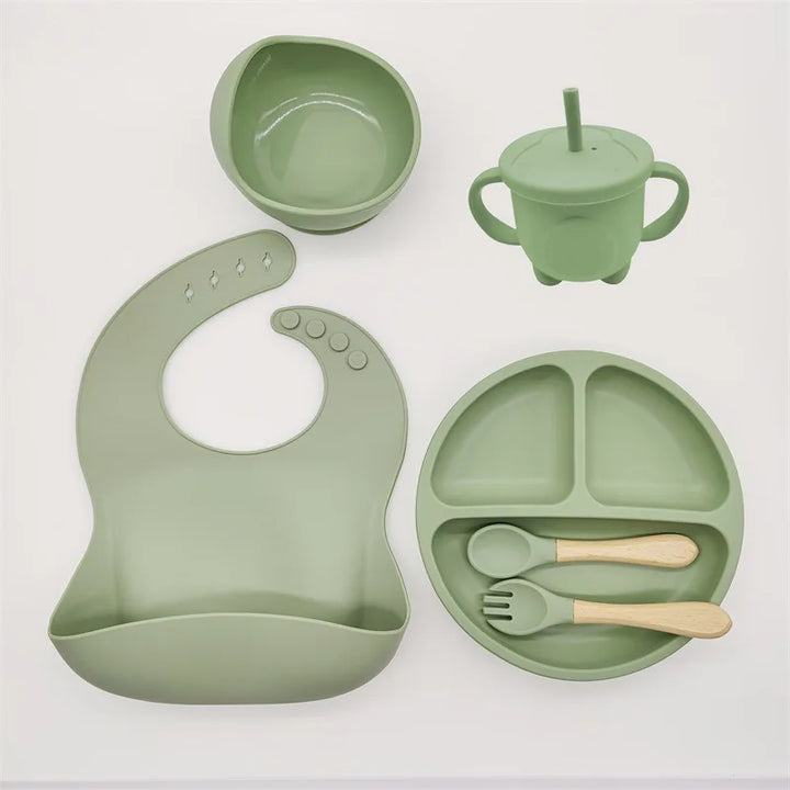 Toddler silicone feeding set by TinyBites, designed for self-feeding & less mess with suction.