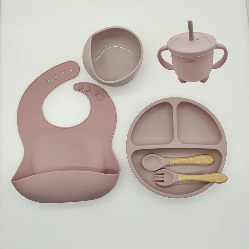 Thoughtful baby gift: TinyBites silicone feeding set for easy weaning and independent eating.
