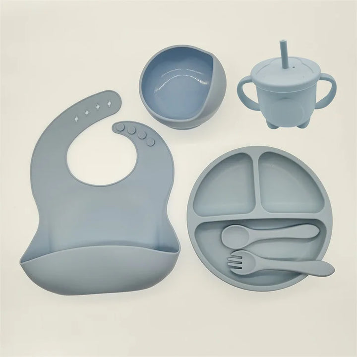 Safe & durable TinyBites silicone feeding set, BPA-free with strong suction plate for babies.