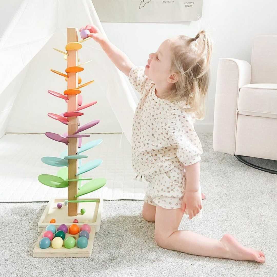 Sound tree marble run: a sensory wooden toy for toddlers, enhancing motor skills with natural wood.