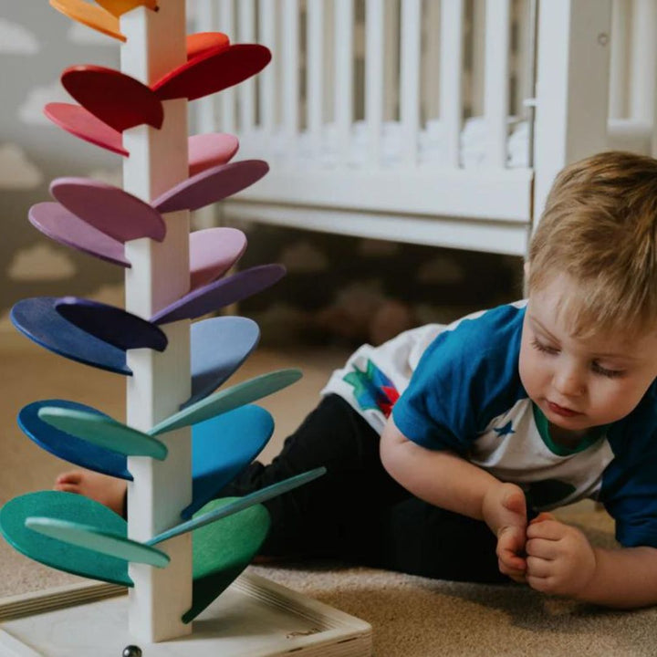 Early development sound tree marble run, a natural wooden toy to build motor skills in kids.