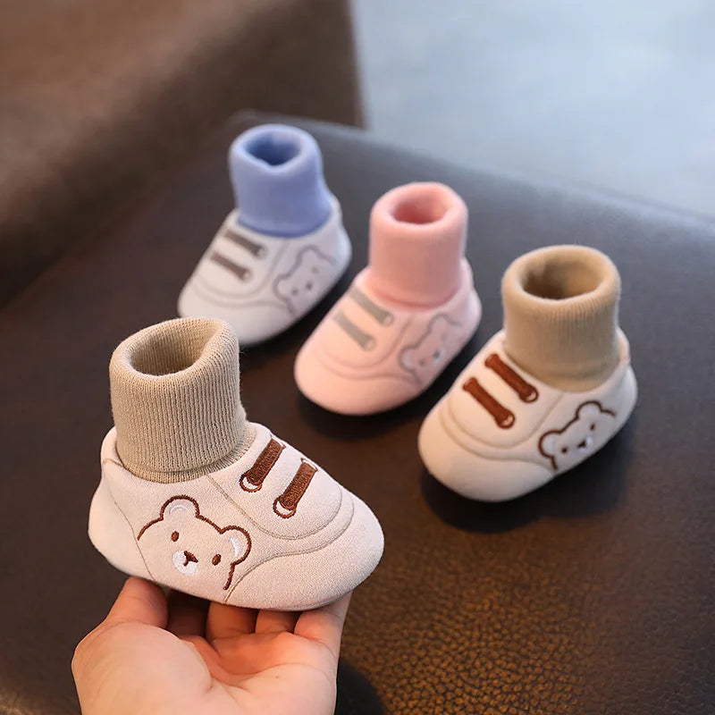 Toddlers' anti-slip socks shoes, safe for first steps. Comfortable, soft-sole infant footwear for boys & girls.