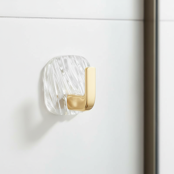 Transparent AcryGrip adhesive wall hook, no-drill solution for seamless home organization.