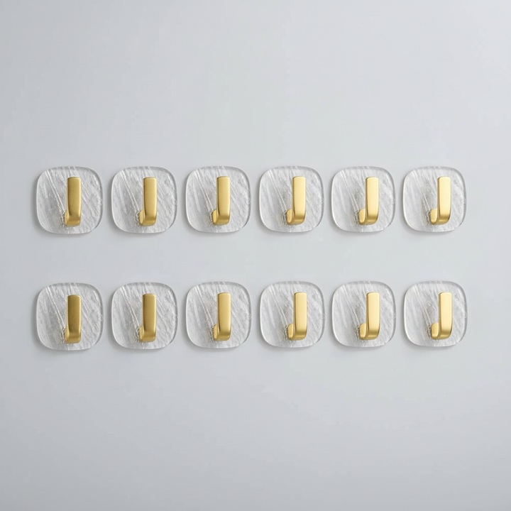 Sticky transparent hook for walls, providing strong adhesion for various home organization needs.