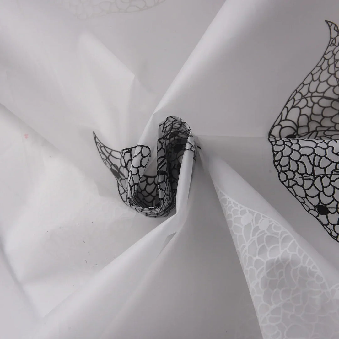 Plastic shower curtain with a stylish aqua leaf pattern, ideal for modern bathrooms. Easy install.