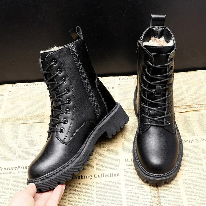 Comfortable black women's winter boots, stylishly designed with a cozy interior & sturdy non-slip grip.