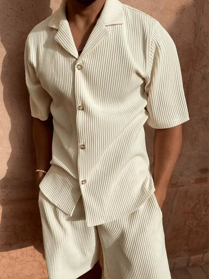 Close-up of the textured corduroy fabric on a men's summer shirt and shorts set, comfortable and stylish.