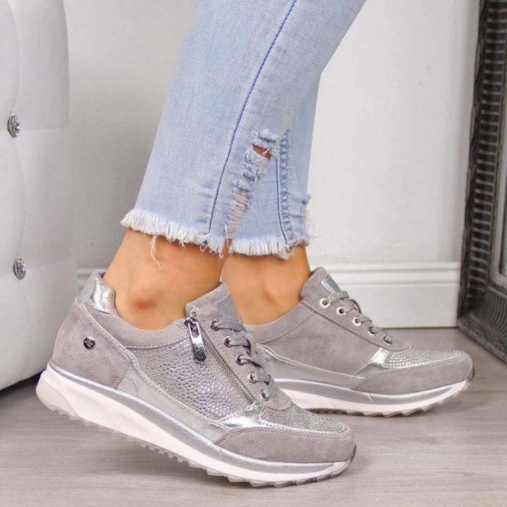 Trendy women's Aria sport shoes in white & pink, ideal for ultimate comfort, walking, & casual everyday wear.