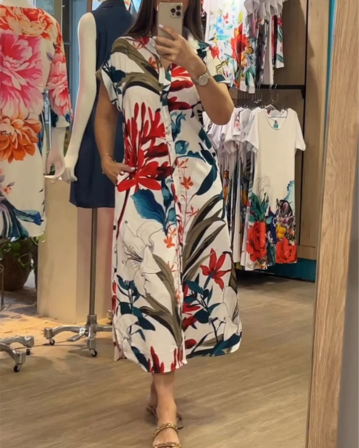 Close-up of the shirt collar and short sleeves on a chic floral print midi dress for women, ideal for spring fashion.