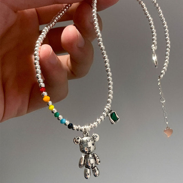 Trendy women's necklace with sparkling white gemstone pendant. Stylish stainless steel jewelry for her.