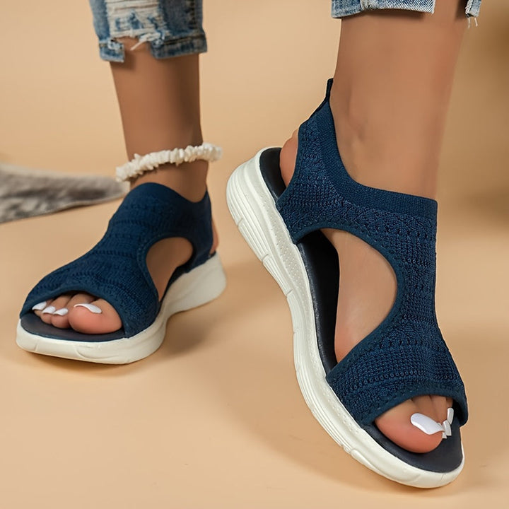 Trendy women's open-toe sandals, ideal for beach trips & casual summer outings. Comfortable fashion.