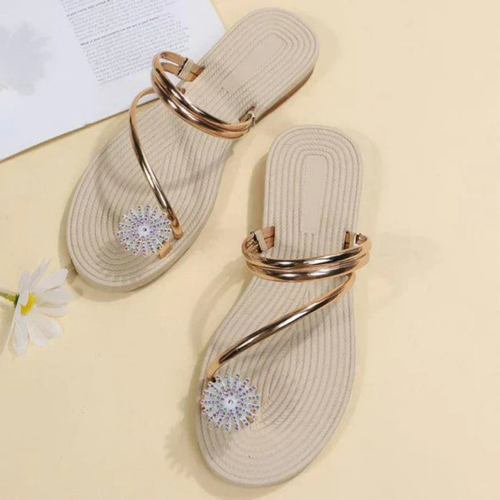 Trendy women's sandals featuring a unique snowflake accent, perfect for summer fashion.