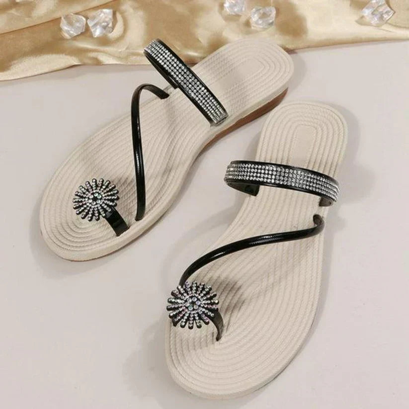 Elegant women's summer footwear, featuring a delicate snowflake detail, suitable for versatile styling.