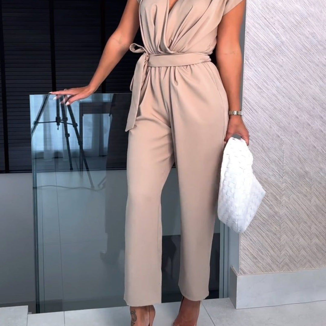 Trendy women's summer jumpsuit with short sleeves and waist emphasis, perfect for casual spring & summer wear.