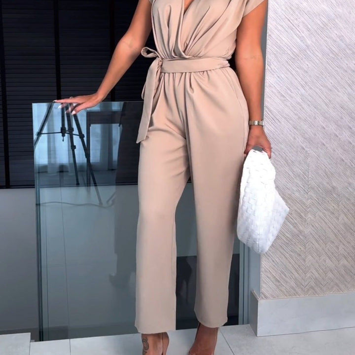 Trendy women's summer jumpsuit with short sleeves and waist emphasis, perfect for casual spring & summer wear.