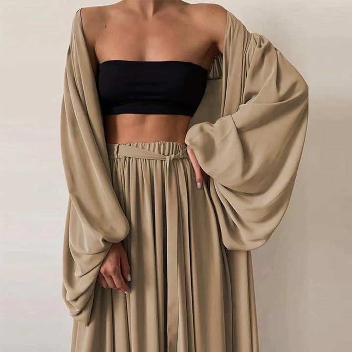 Versatile women's summer two-piece set: trendy top & comfy trousers. A perfect matching outfit for casual, holiday, or loungewear.