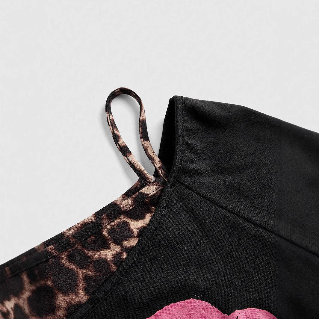 Fashionable Zaria women's off-shoulder top in black leopard print. A comfortable & versatile statement design blouse.