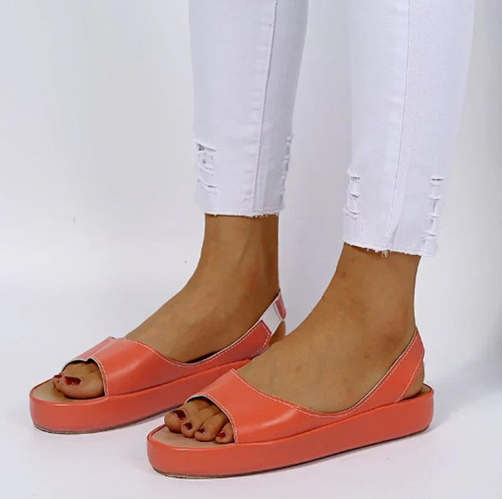 Stylish women's slip-on slides for everyday casual wear. Trendy open-toe design, comfortable & fashionable.