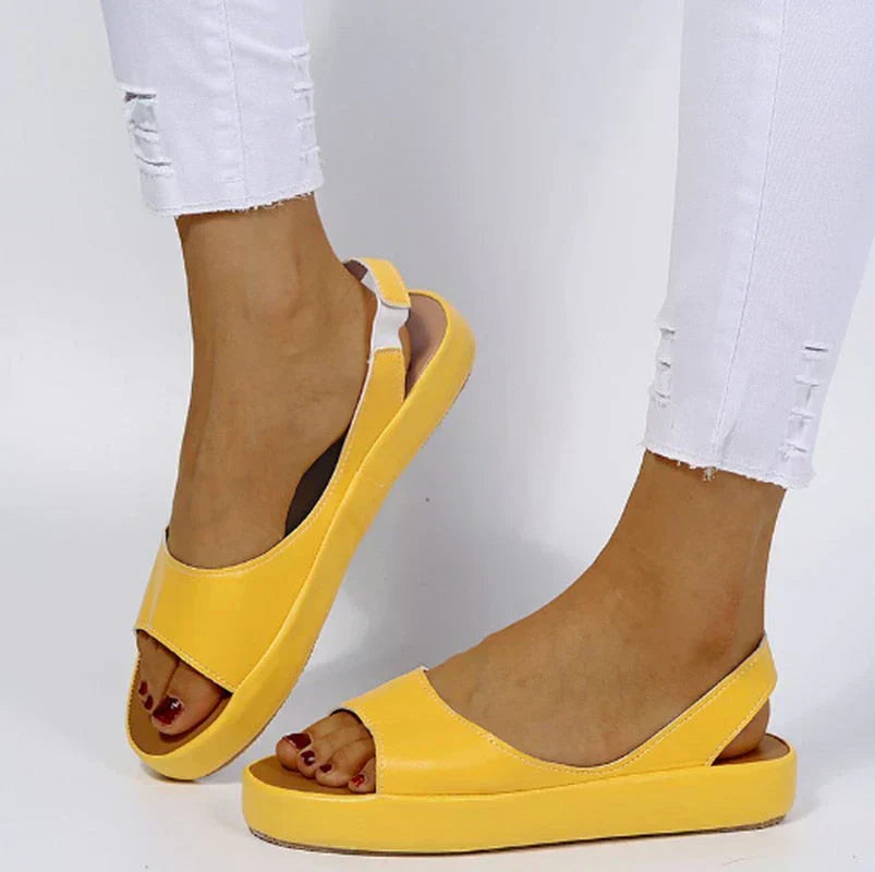 Soft & cushioned women's slip-on sandals for ultimate summer comfort. Trendy open-toe design, relaxed everyday wear.