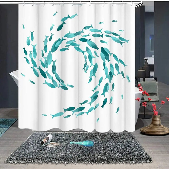 Close-up of washable turquoise shower curtain fabric showing textured fish print and included hooks.