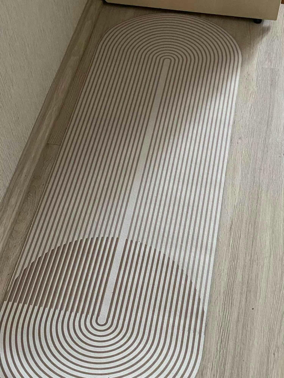 Non-slip entryway floor mat, ultra-absorbent to trap dirt & moisture, washable textile for home.