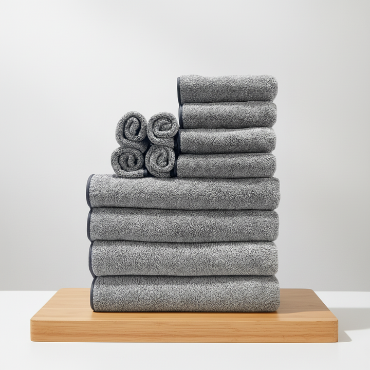 Absorbent coral fleece hand towel draped, emphasizing its soft feel and durability