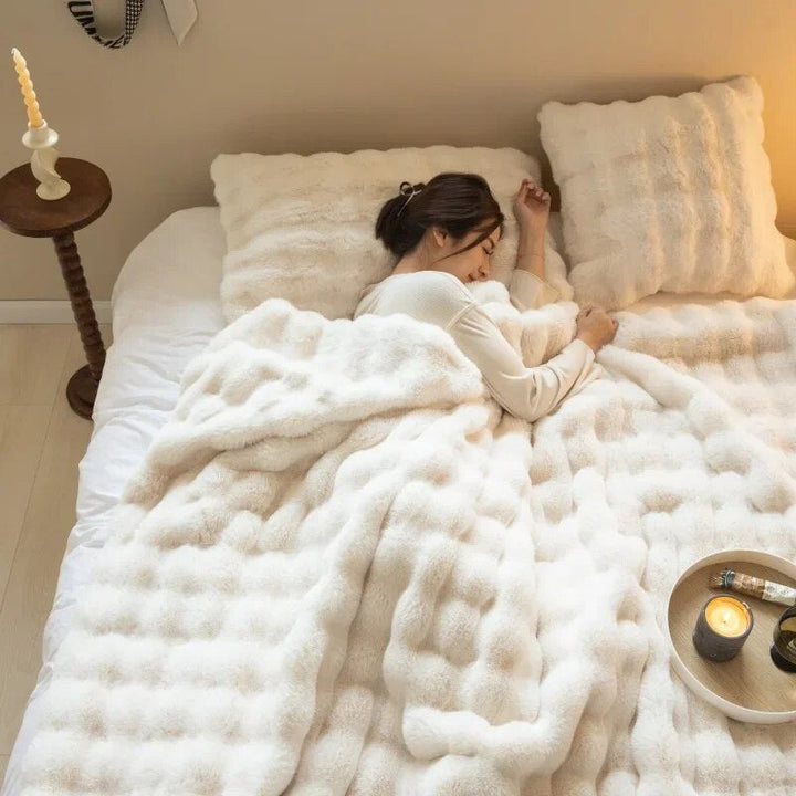 Luxurious and warm fleece throw blanket, an ultra-soft plush gift idea for cozy comfort in your home.