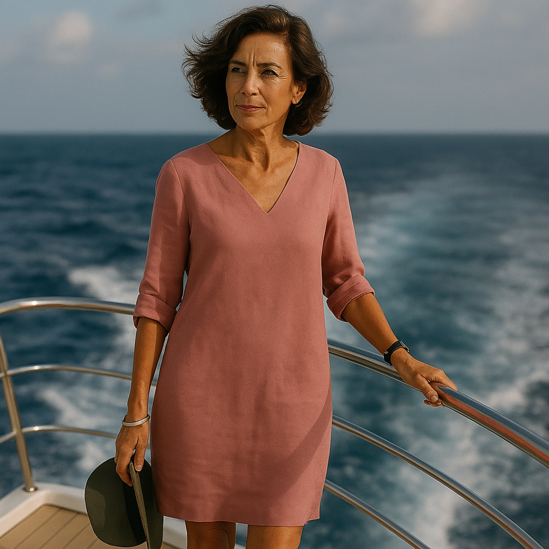 Flowy midi summer dress for women, offering comfortable and versatile fashion. Unique style for casual or elegant wear.