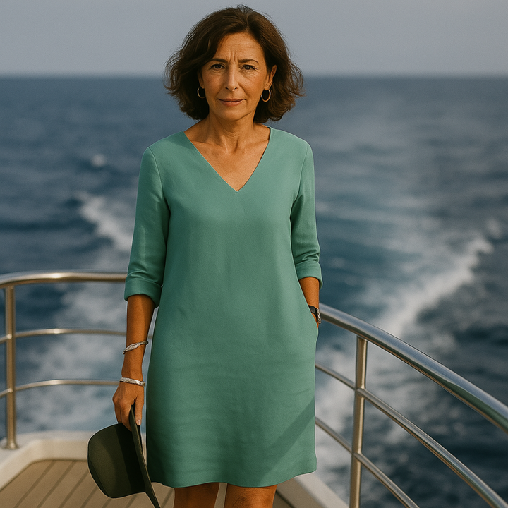 Unique flowy summer midi dress for women, embodying effortless style. A comfortable holiday outfit for versatile fashion.