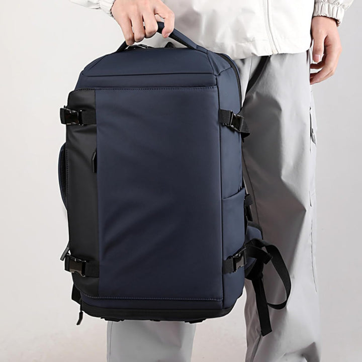Unisex 15-inch waterproof laptop backpack with side-open design and integrated USB-C charging port.