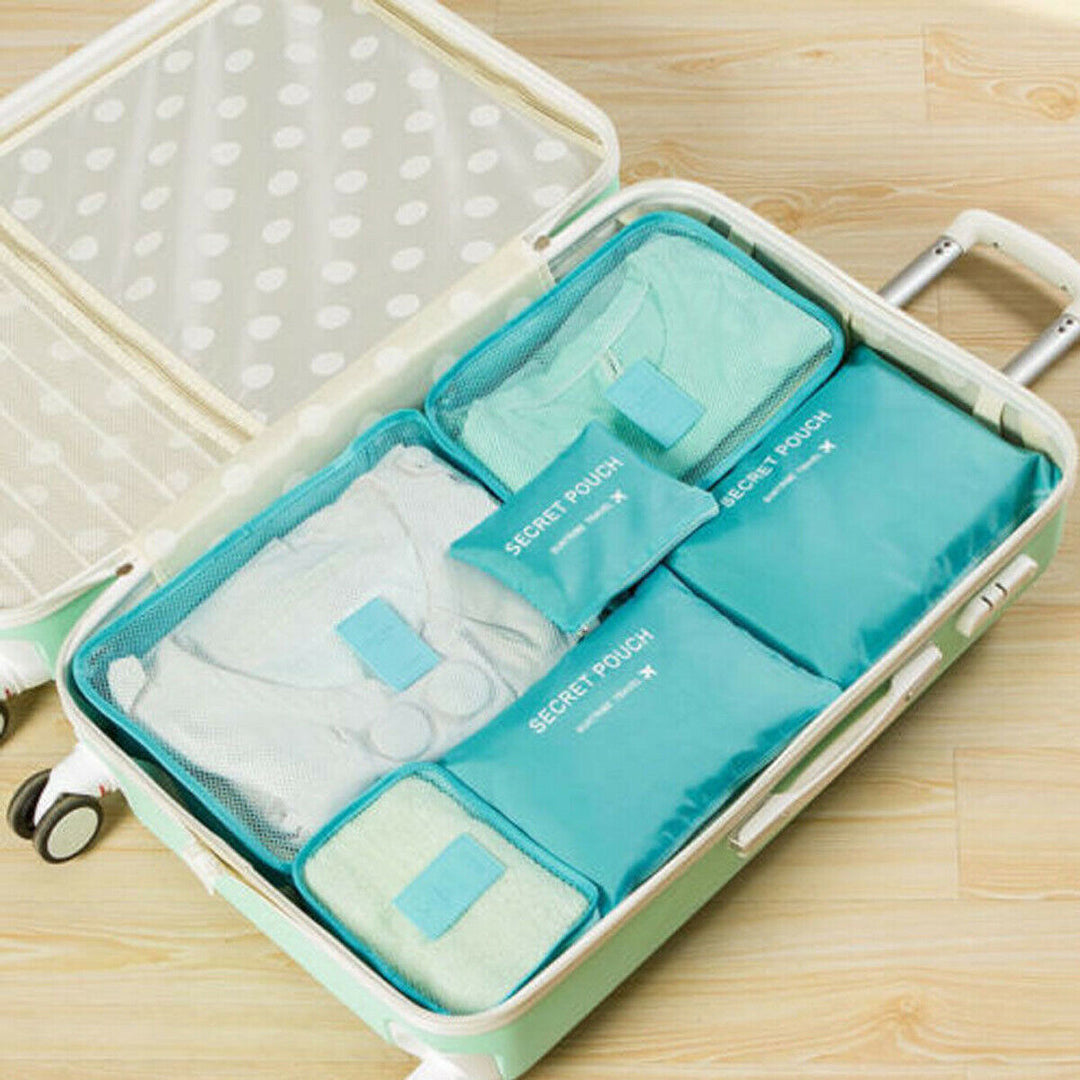 Two black packing cubes side-by-side, ready for travel packing