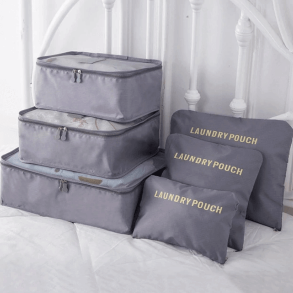 Water-resistant fabric of a black travel storage bag tested with drops