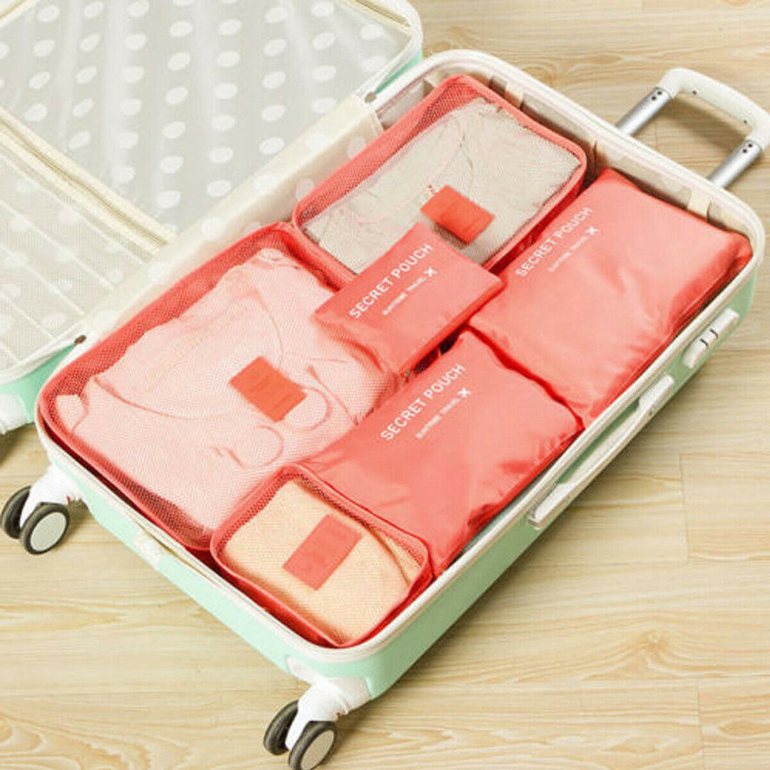 Unisex travel organizer set in a suitcase, optimizing luggage space