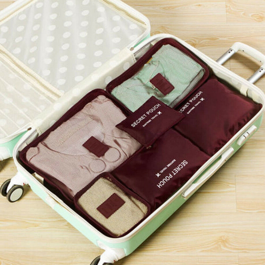 Black packing cubes, essential travel accessories for organized luggage