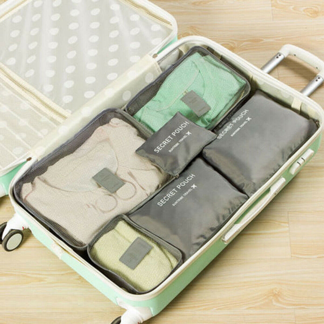 Organize your suitcase with a 2-set of unisex travel packing cubes. Space-saving storage bags.