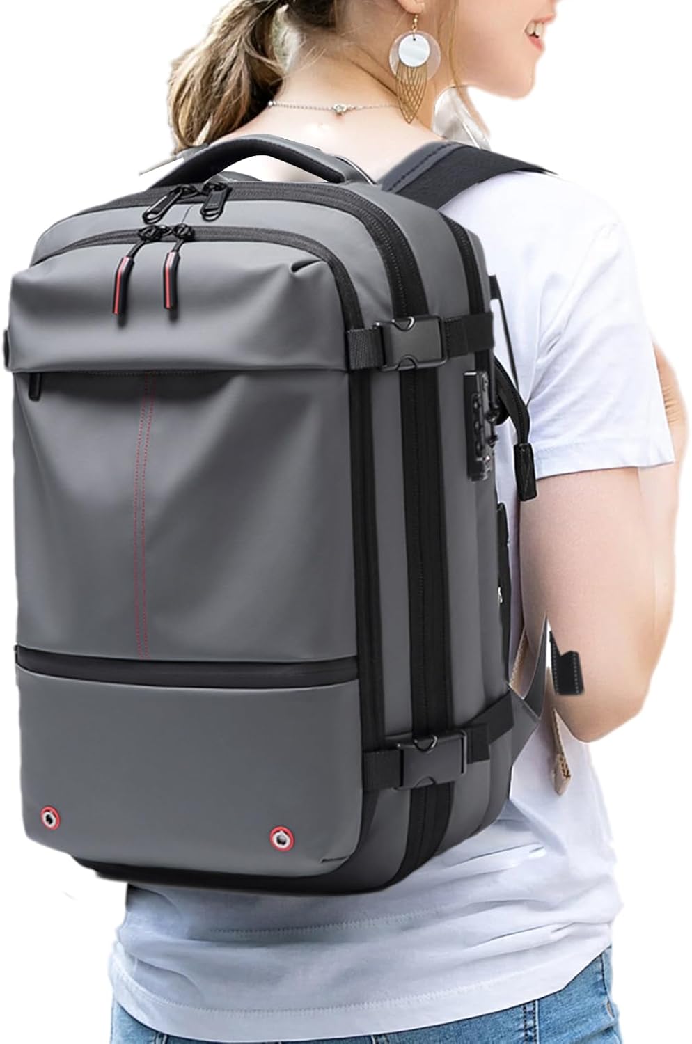 Close-up of the waterproof fabric and robust zippers of the 60L travel backpack.