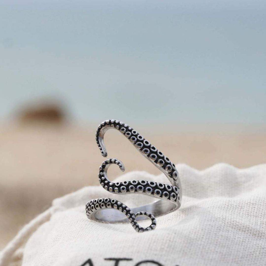 Unisex adjustable silver tentacle ring, handcrafted with ocean-inspired design. Unique statement jewelry.