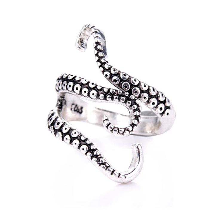 Close-up of a shimmering silver tentacle ring, adjustable and perfect for ocean lovers. Unisex unique jewelry.