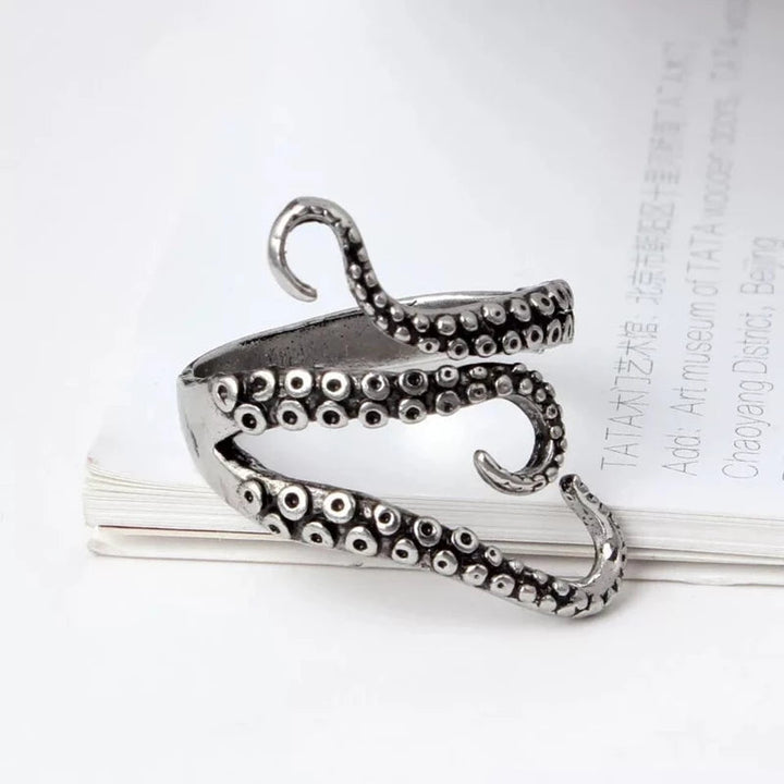 Handmade adjustable silver ring featuring a detailed tentacle design, unisex and a unique statement piece.