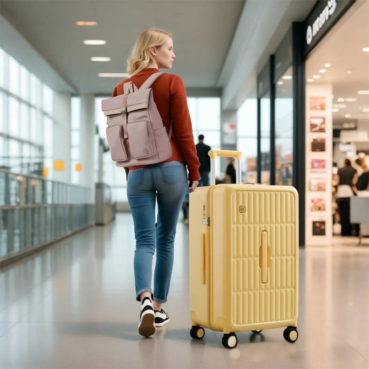 Unisex 20-inch hardshell carry-on luggage, 3:7 split, showing sturdy top handle for convenient lifting, travelbag