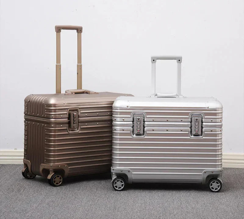 Robust silver aluminum-magnesium hardshell suitcase open, revealing organized interior for efficient packing.