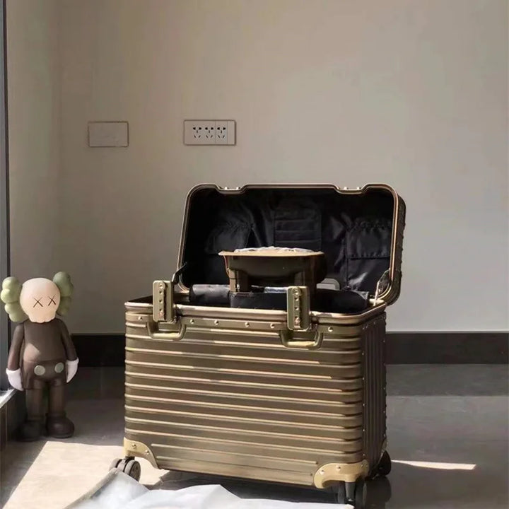 Premium aluminum-magnesium hardshell suitcase with brushed metallic finish, durable and lightweight for travel.