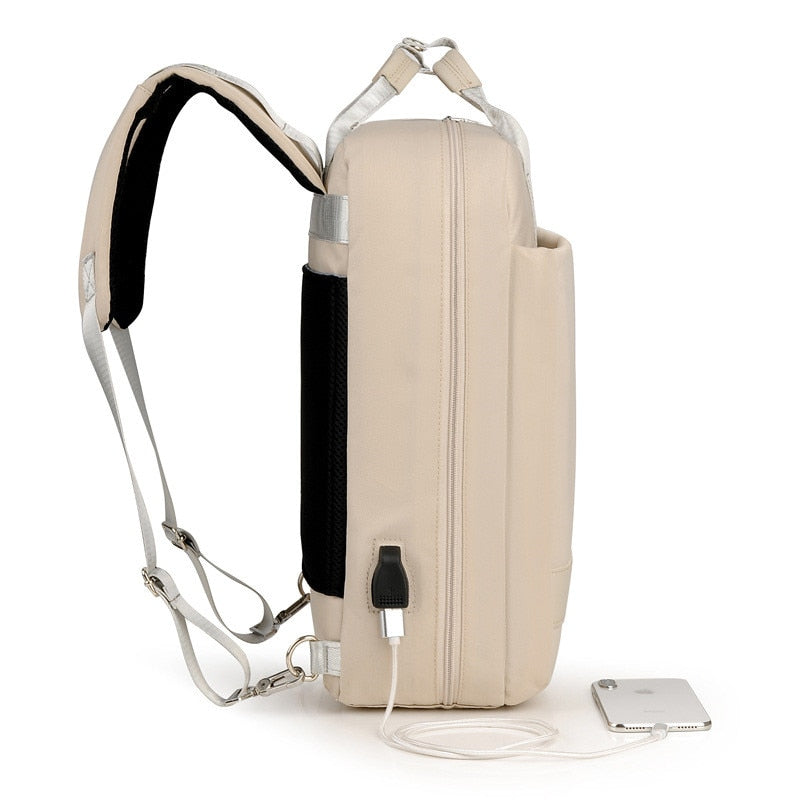 Modern anti-theft laptop backpack with multiple organizer pockets & external USB port.