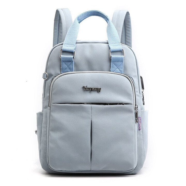 Front view of a sleek anti-theft backpack, perfect for secure daily commute & travel with USB charging.